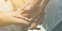 Linking hands AdobeStock_186411793 just angled (3)